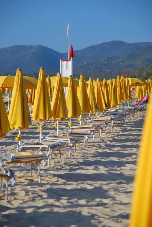 Italy, Sardinia, Costa Rei – yellow parasols, 2010