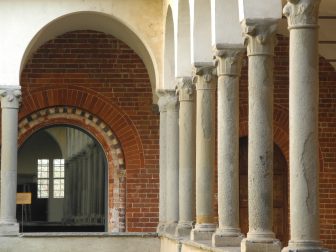 Italy-Lombardy-Morimondo Abbey-cloister-pillars-arch