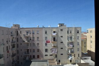 Italy-Sardinia-Alice's Colourful House-view-building-blue sky