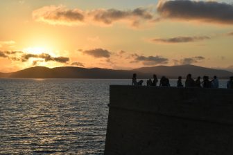 Italy-Sardinia-Alghero-sea-sunset-people-silhouettes