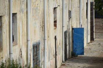 Italy-Sardinia-Asinara-prison-Fornelli-building-blue door