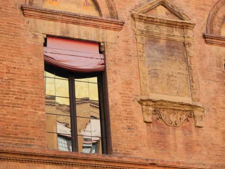 town – reflection on window, June 2015 (Emilia-Romaña)