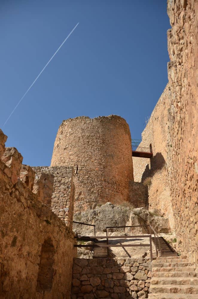 Spain, Consuegra – castle and contrail, Mar.2014