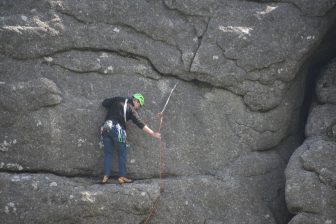 England-Devon-Dartmoor-Haytor-rock climbing-person