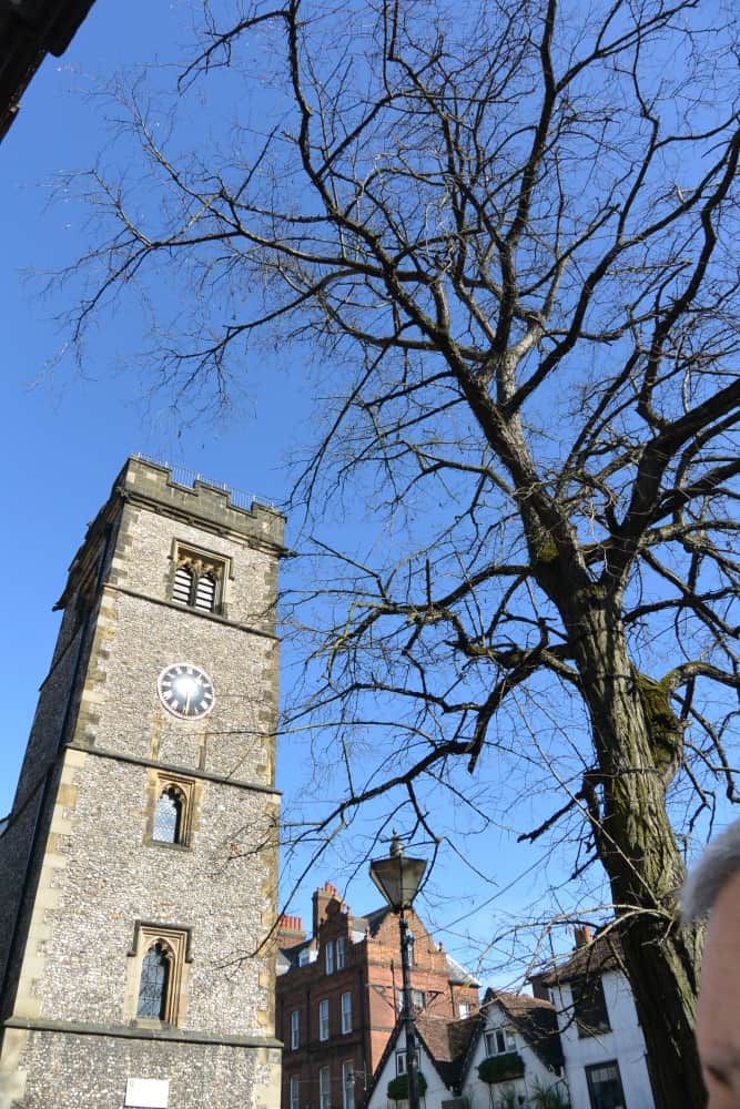 Clock tower and people