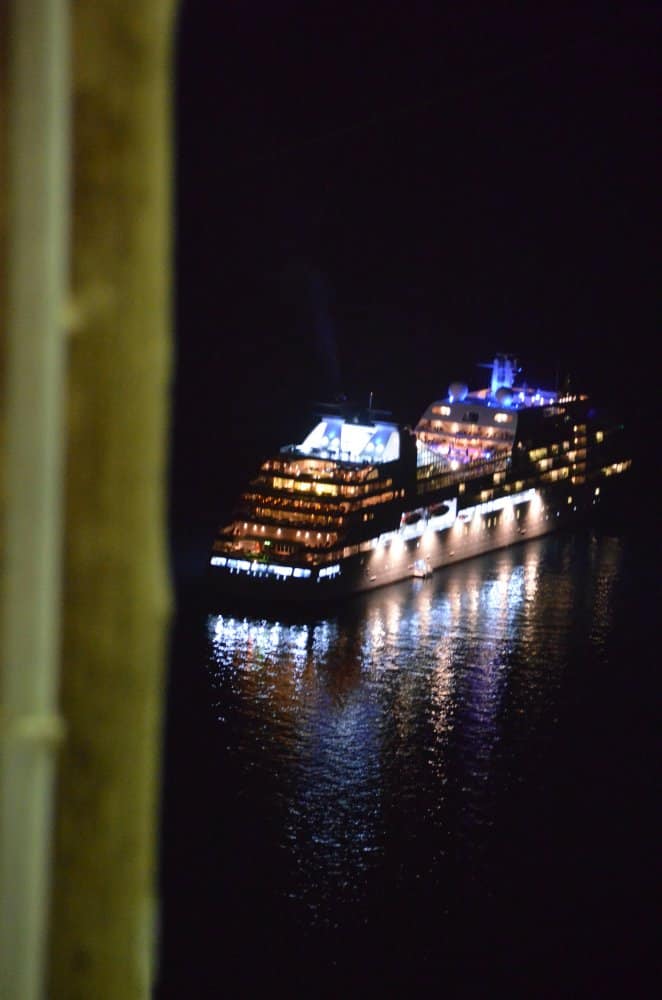 Greece, Santorini, Fira – light of boat, Aug. 2013 (Santorini)