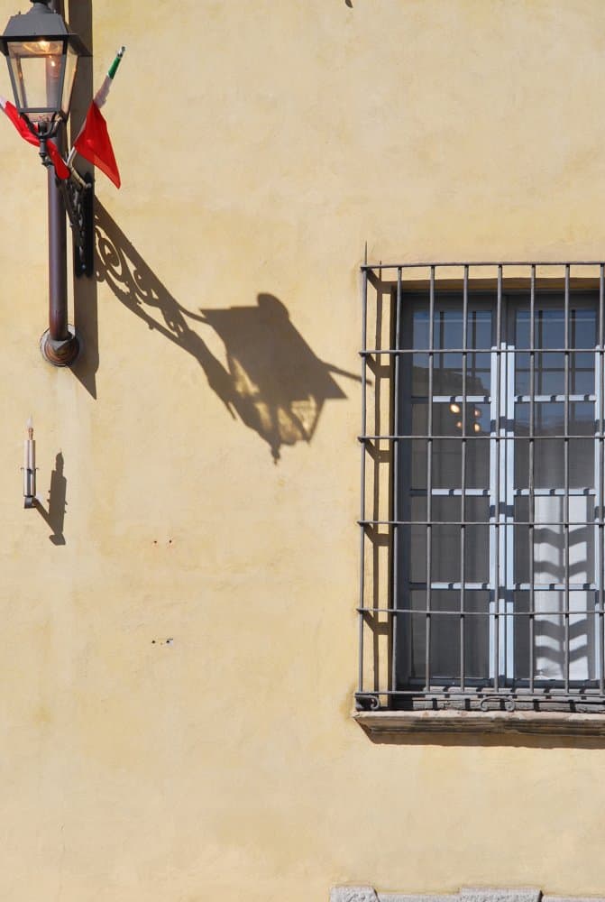 Italy, Piacenza – lamp, shadow and window, June 2013 (Emilia-Romaña)