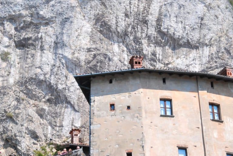 A monastery flattened against the rock