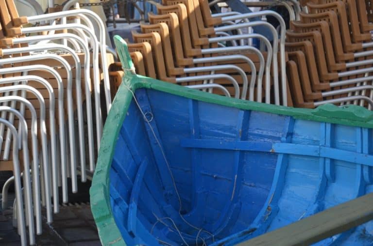 Malta, Marsaxlokk – boat and chairs, Feb. 2013