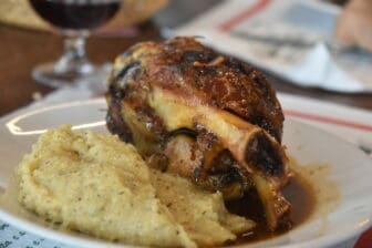 Polenta and Stinco at Rifugio Martina, the restaurant in the mountain above Lake Como