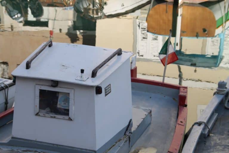 Italy, Muggia – flag on boat, Feb. 2014 (Trieste)