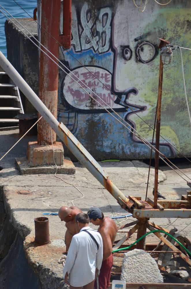 Ukraine, Yalta – graffiti and men, July 2013 (Yalta)