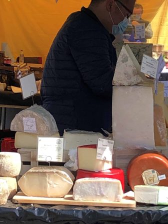 cheese and the vendor at the Chiswick cheese market