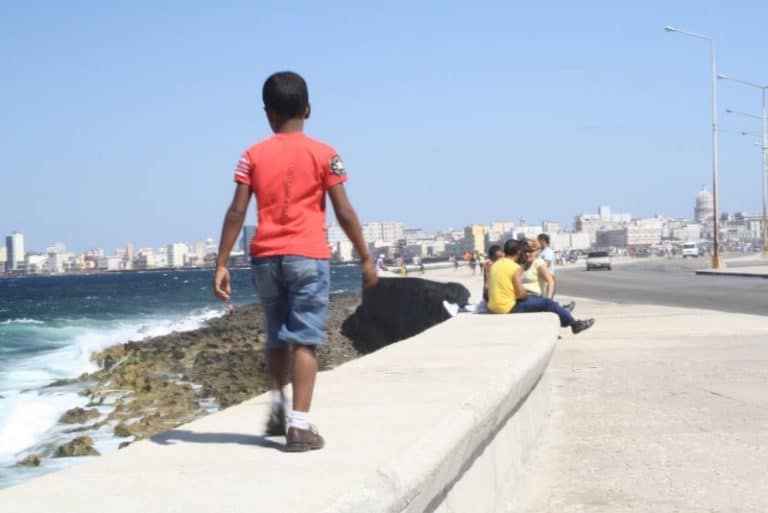 cuba-havana- malecon-boy
