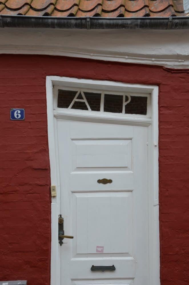Denmark, Ribe – warped door, July2012 (Ribe)