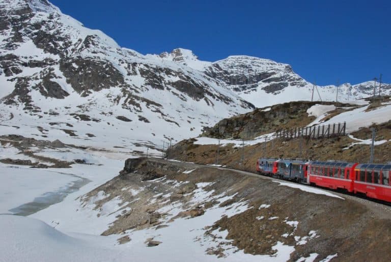 Switzerland, Bernina Express – train in a snowy view, May 2012