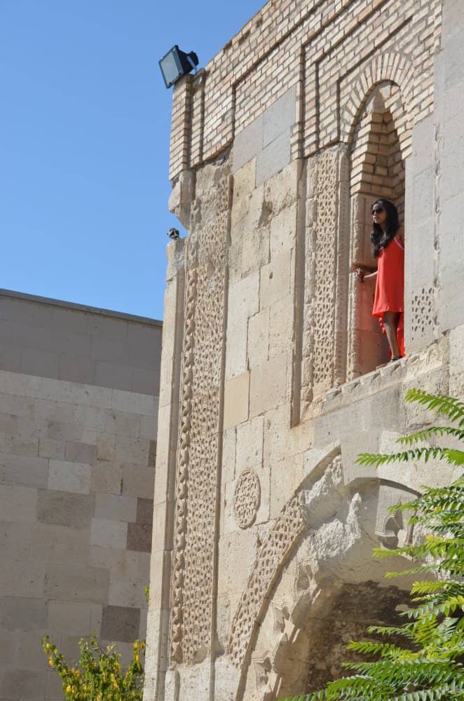 Turkey, Agzikarahan – woman in red, Aug.2012