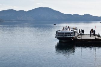 Japan-Akita-Lake Tazawa-boat-pier-people-quiet-water-view-mountains