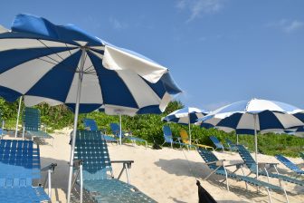 Japan-Miyakojima-hotel beach-parasols-deck chairs