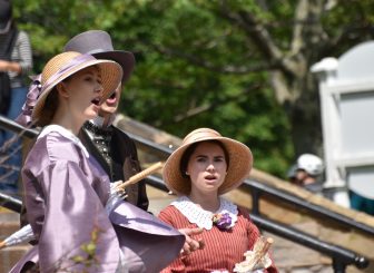 Canada-Prince Edward Island-Charlottetown-people in costume-singing