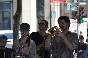 Canada-Montreal-Place d'Armes-young people-playing-jazz