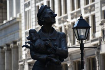 Canada-Montreal-Place d'Armes-statue of French Canadian woman