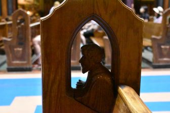 Canada-Montreal-Notre Dame Basilica-carving-pew