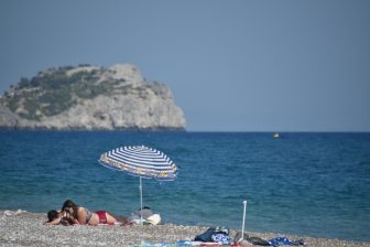 Greece-Rhodes-Afandou beach-parasol-people-sea