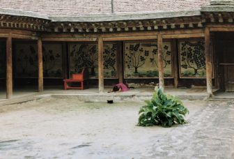 China-Gansu-Xiahe-Labrang Monastery-person-praying