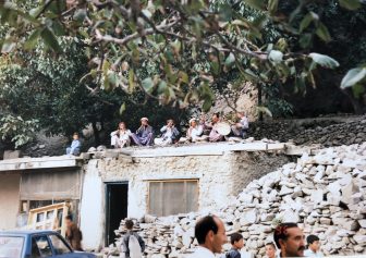 Pakistan-Karimabad-Old Polo Ground-musicians-on the roof