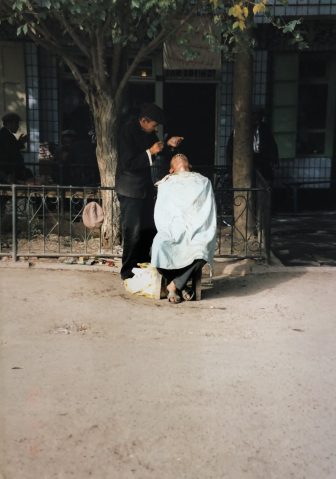 China-Kashgar-barber-customer-outdoor