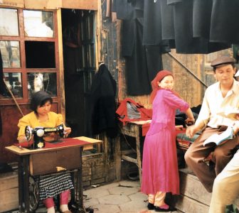 China-Kashgar-bazaar-people-coat shop