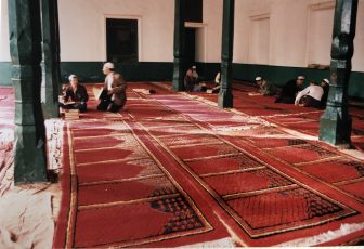China-Kashgar-Id Kah Mosque-red-rugs-people