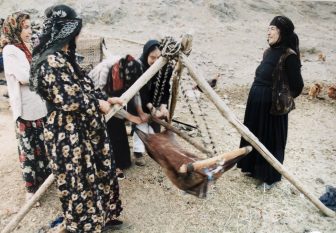 Iran-near Hamadan-nomad people-making butter