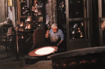 Iran-Isfahan-bazaar-man-working-copper