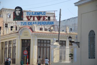 Che Guevara's picture on the board in Cienfuegos