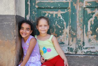 two young girls near the market in Trinidad in Cuba