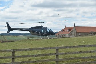 a helicopter parked outside of the restaurant in Northumberland