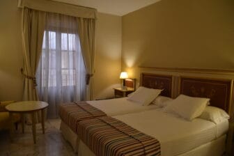 the bedroom of the hotel, Alcazar de la Reina in Carmona in Andalusia