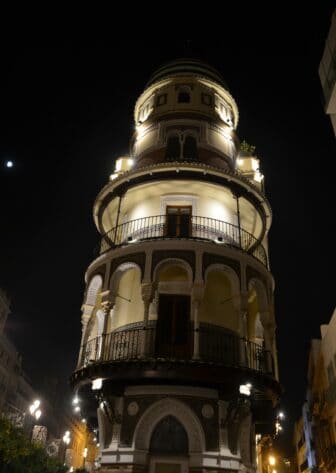 a building in Seville at night