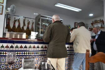 the tapas bar where locals come and chat in Seville