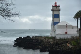 a view of Cascais with a lighthouse