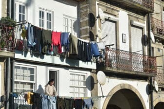 clothes being dried on the house along Douro River