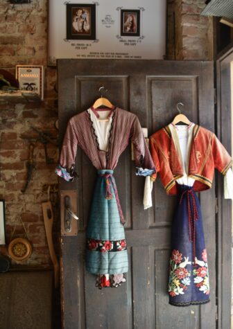 costumes on the door of the photo studio in Plovdiv