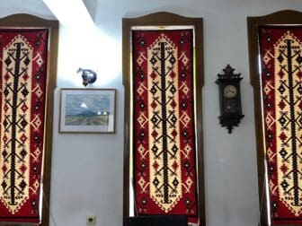 the kilims at the windows of the guesthouse in Chiprovtsi, Bulgaria