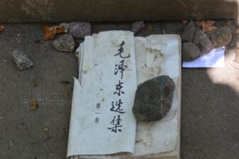 one of the Chinese books being offered at the Marx's original grave in Highgate Cemetery 