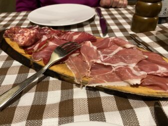 the salami and ham platter at La Vecchia Lira, a restaurant in Milan