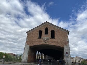 the entrance of Ponte Coperto in Pavia, Italy