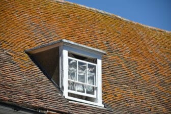 an old roof with a window in Rye, England