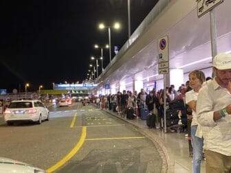 a long queue for taxi at the airport in Milan one night before we flew to Siciy